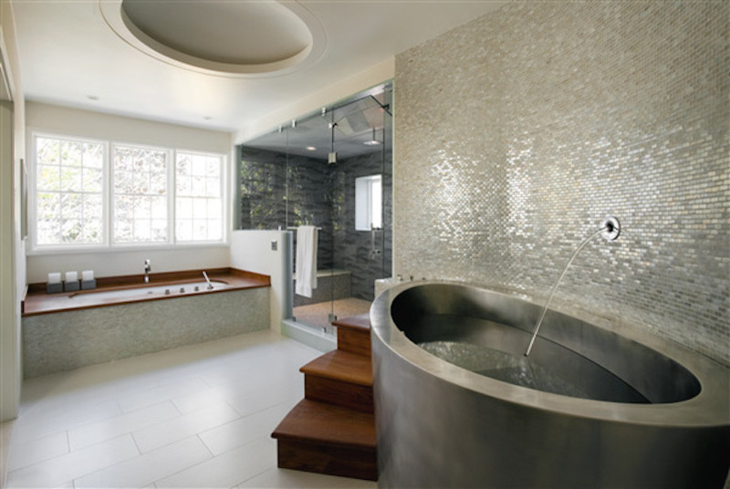 Photo of a contemporary ensuite bathroom in Toronto with a built-in bath, a corner shower, grey tiles, metal tiles and white walls.