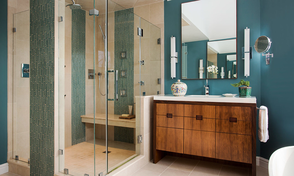 ボストンにある中くらいなトランジショナルスタイルのおしゃれな浴室 (フラットパネル扉のキャビネット、中間色木目調キャビネット、青い壁、セラミックタイルの床、青いタイル、ボーダータイル、開き戸のシャワー) の写真