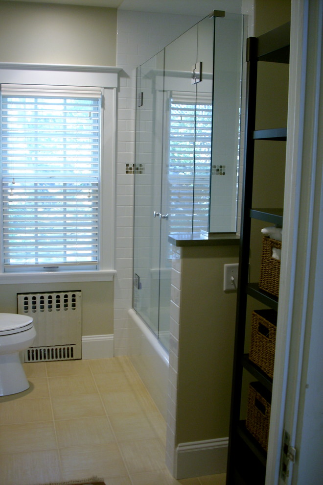 Example of a mid-sized transitional kids' white tile and porcelain tile porcelain tile bathroom design in Boston with an undermount sink, shaker cabinets, white cabinets, quartzite countertops, a two-piece toilet and green walls