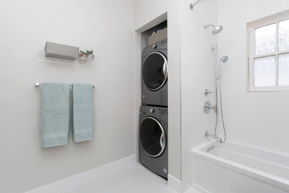 This is an example of a small classic shower room bathroom in Dallas with raised-panel cabinets, grey cabinets, an alcove bath, a shower/bath combination, a one-piece toilet, white walls, a submerged sink, engineered stone worktops, white floors, a shower curtain, grey worktops and a laundry area.