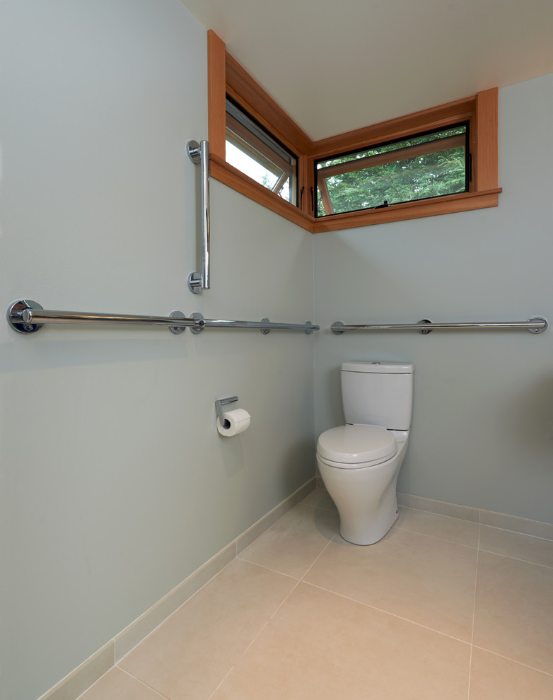 Design ideas for a medium sized contemporary cloakroom in Seattle with a two-piece toilet, white tiles, metro tiles, white walls, ceramic flooring and a submerged sink.