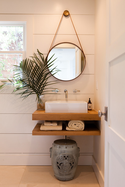 35 Horizontal Shiplap Wall Ideas; white shiplap in bathroom, bathroom shiplap, shiplap walls in bathrooms, floating sink, round mirror with rope