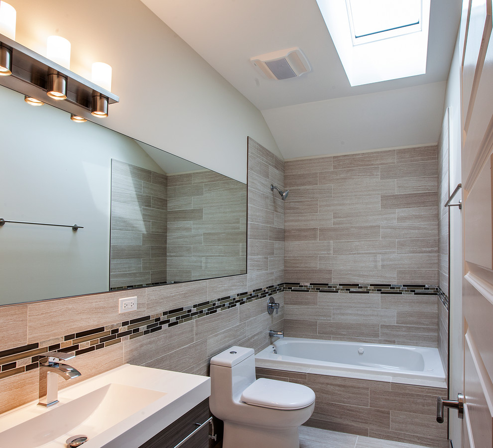 Example of a mid-sized minimalist 3/4 beige tile bathroom design in Chicago with glass-front cabinets and tile countertops