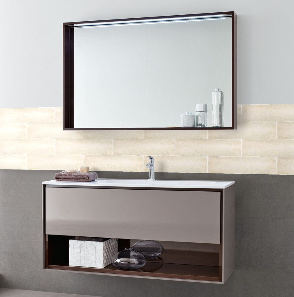 This is an example of a large contemporary bathroom in San Francisco with a vessel sink, open cabinets, black cabinets, glass worktops, beige tiles, glass tiles, beige walls and concrete flooring.