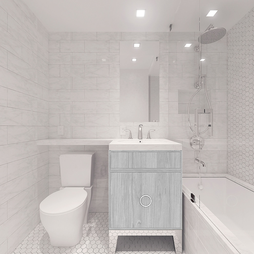 Example of a transitional kids' stone tile and gray tile porcelain tile tub/shower combo design in New York with furniture-like cabinets, medium tone wood cabinets, a two-piece toilet, an undermount sink, quartz countertops, an undermount tub and gray walls