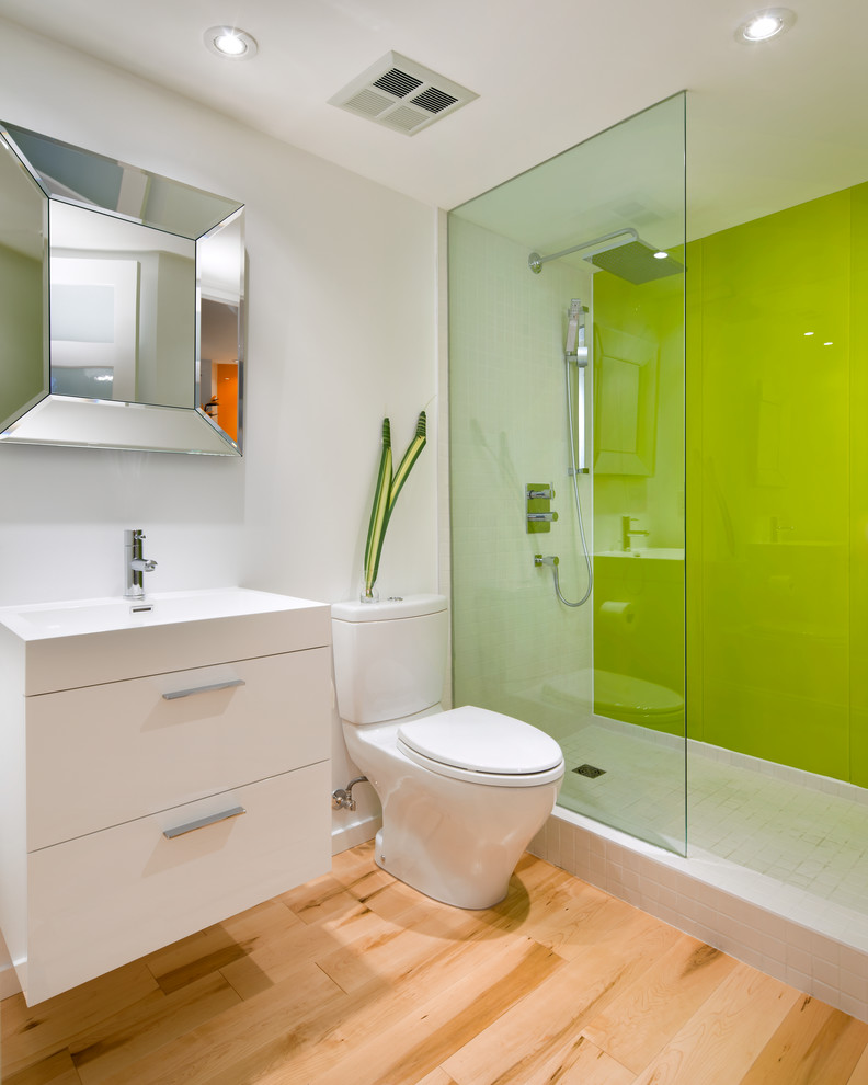 Example of a trendy bathroom design in Toronto with flat-panel cabinets and white cabinets