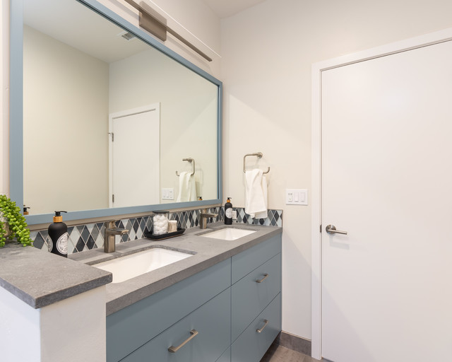 Bathroom Pony Wall, Dual Vanity and a Generous Mirror Contemporary