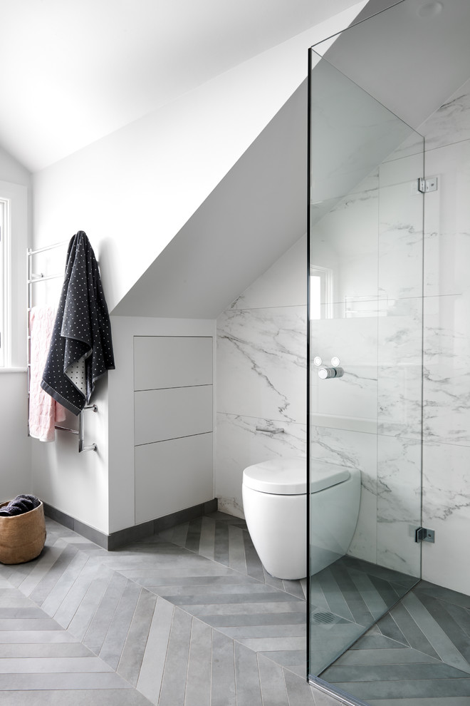 Open shower - mid-sized contemporary master gray tile and porcelain tile porcelain tile open shower idea in Sydney with white cabinets, a one-piece toilet, white walls and flat-panel cabinets