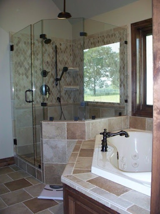 Inspiration for a large timeless master beige tile and ceramic tile ceramic tile alcove shower remodel in Oklahoma City with recessed-panel cabinets, dark wood cabinets, tile countertops, a hot tub and white walls