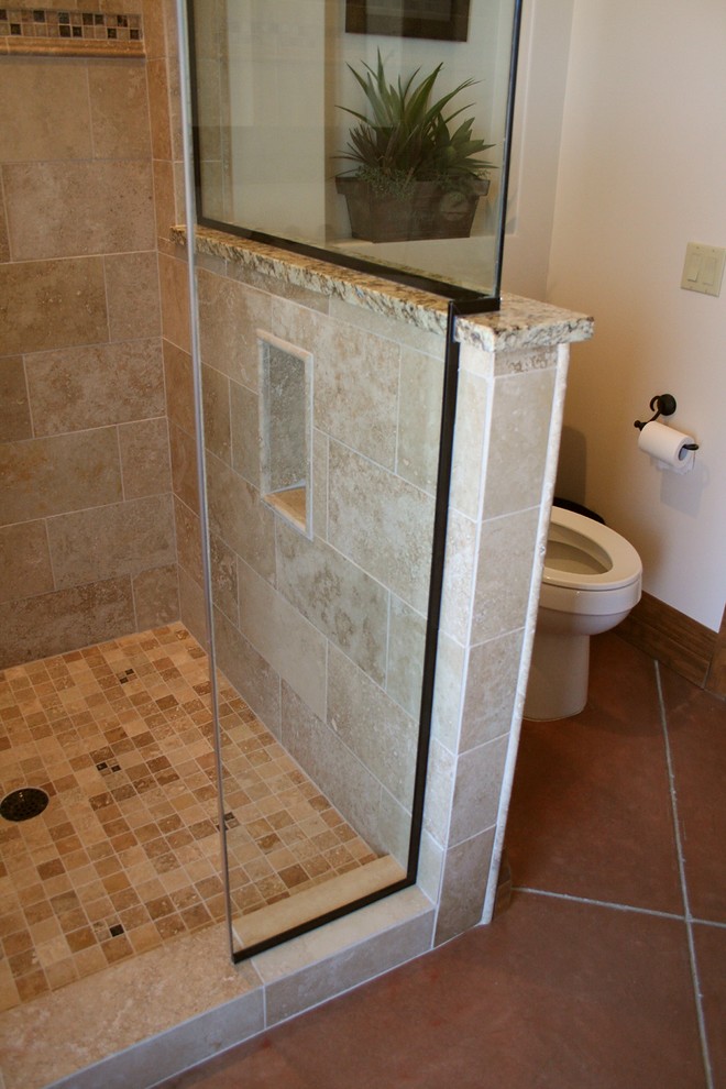 Alcove shower - mid-sized traditional 3/4 beige tile, black tile, brown tile and ceramic tile ceramic tile alcove shower idea in Phoenix with shaker cabinets, black cabinets, a one-piece toilet, white walls, a vessel sink and wood countertops