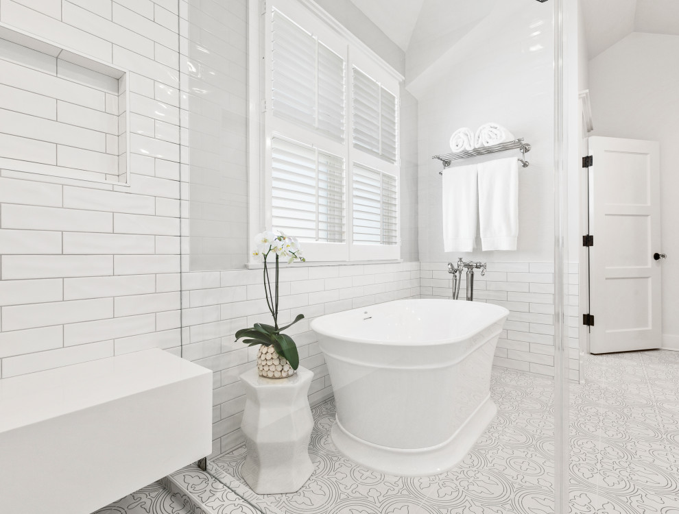Inspiration for a large transitional master white tile and subway tile porcelain tile and multicolored floor bathroom remodel in Los Angeles with furniture-like cabinets, distressed cabinets, white walls and white countertops