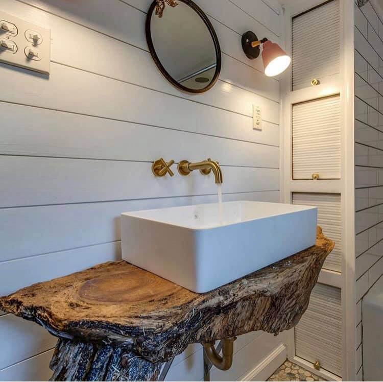 Example of a mid-sized country 3/4 white tile and wood-look tile single-sink bathroom design in Nashville with medium tone wood cabinets, white walls, a vessel sink, wood countertops and a built-in vanity