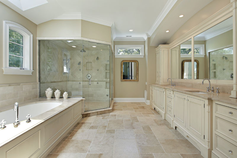 Large master beige tile and stone tile travertine floor corner shower photo in Los Angeles with shaker cabinets, white cabinets, an undermount tub, a bidet, brown walls, an undermount sink and marble countertops