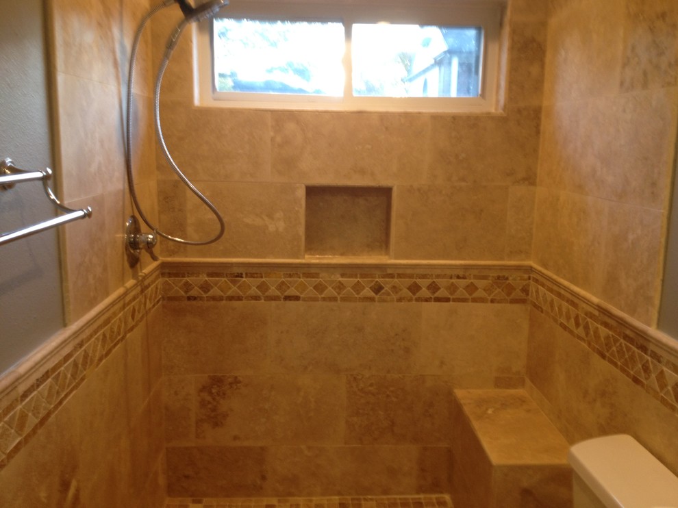This is an example of a small traditional shower room bathroom in Houston with a corner shower, brown tiles, ceramic tiles, grey walls and an open shower.