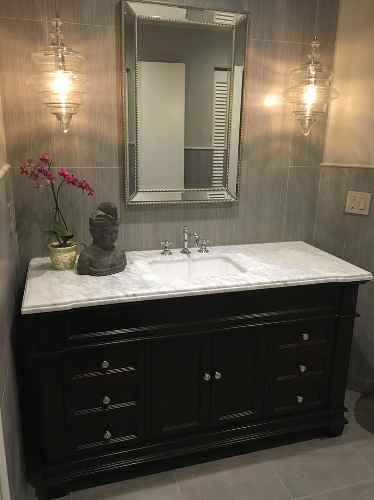 Medium sized contemporary shower room bathroom in Miami with freestanding cabinets, dark wood cabinets, a two-piece toilet, grey walls, slate flooring, a submerged sink, marble worktops and grey floors.