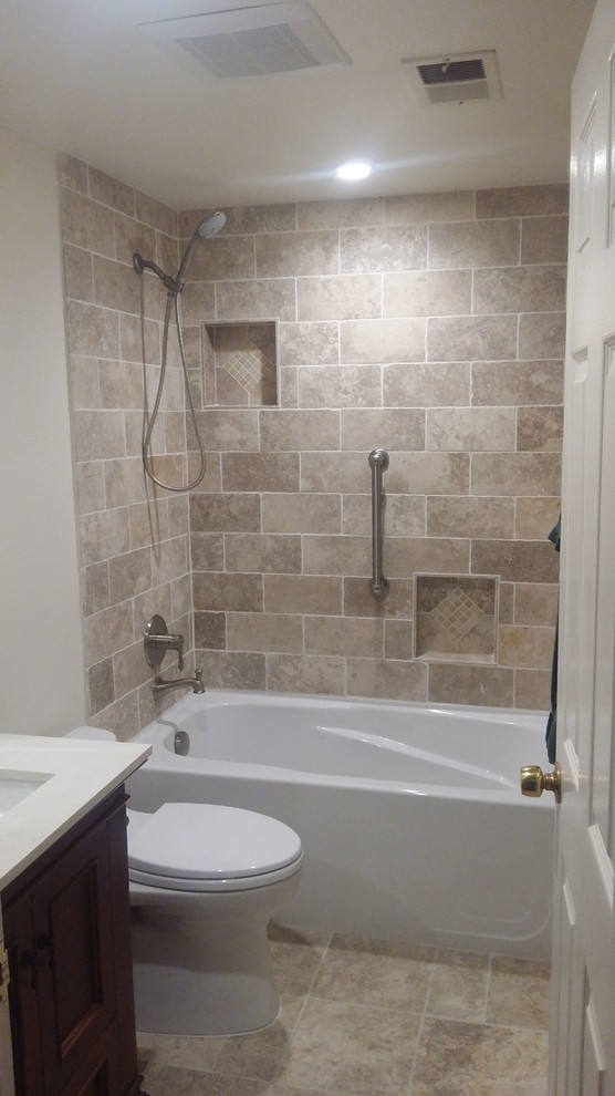 Small mediterranean shower room bathroom in San Francisco with medium wood cabinets, white walls, quartz worktops, recessed-panel cabinets, an alcove bath, a shower/bath combination, a two-piece toilet, beige tiles, ceramic tiles, ceramic flooring, a submerged sink, beige floors and a sliding door.