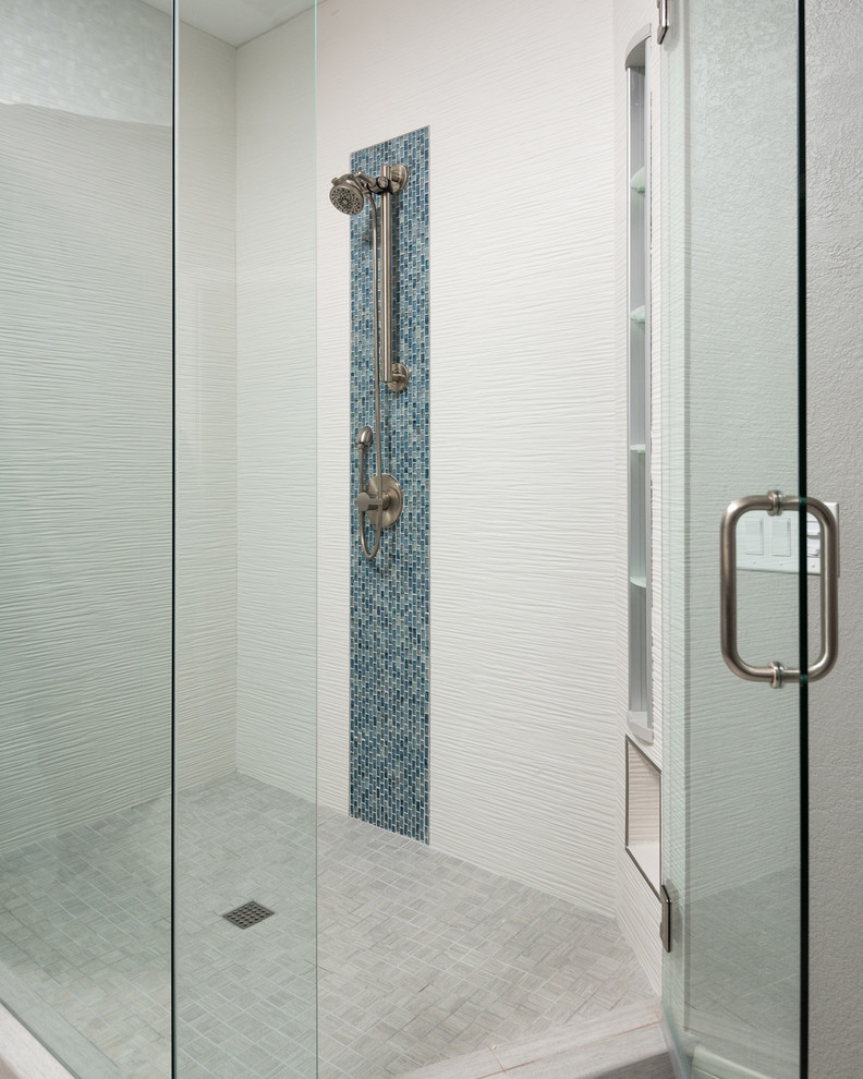 Example of a mid-sized beach style master white tile and porcelain tile porcelain tile bathroom design in San Diego with flat-panel cabinets, dark wood cabinets, a one-piece toilet, beige walls, an undermount sink and quartz countertops