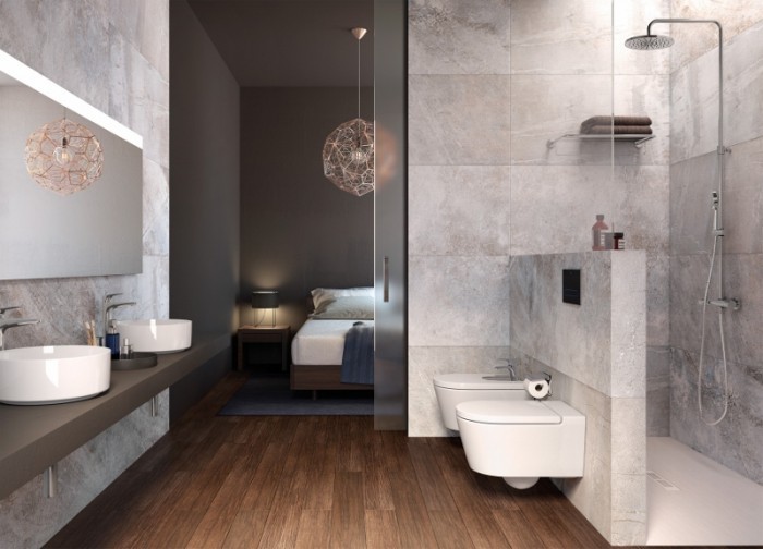 Bathroom - large modern master gray tile and ceramic tile dark wood floor and brown floor bathroom idea in Los Angeles with beige walls, a vessel sink and solid surface countertops