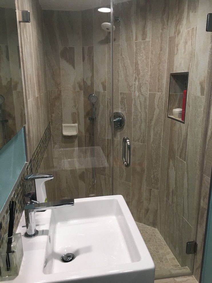 Small modern shower room bathroom in Los Angeles with a corner shower, porcelain tiles, porcelain flooring and a wall-mounted sink.