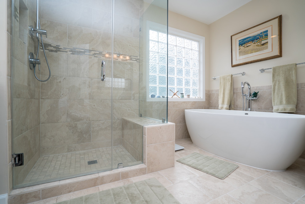 Inspiration for a large contemporary master beige tile and porcelain tile porcelain tile bathroom remodel in DC Metro with raised-panel cabinets, dark wood cabinets, beige walls and a hinged shower door