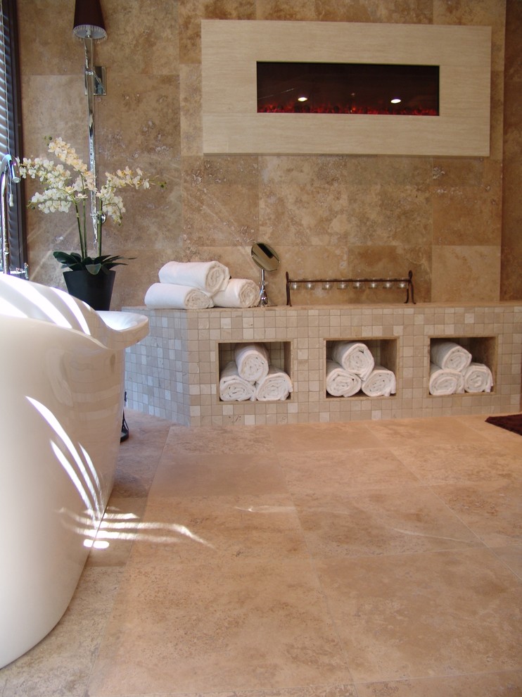 Huge minimalist master stone tile and beige tile travertine floor bathroom photo in Other