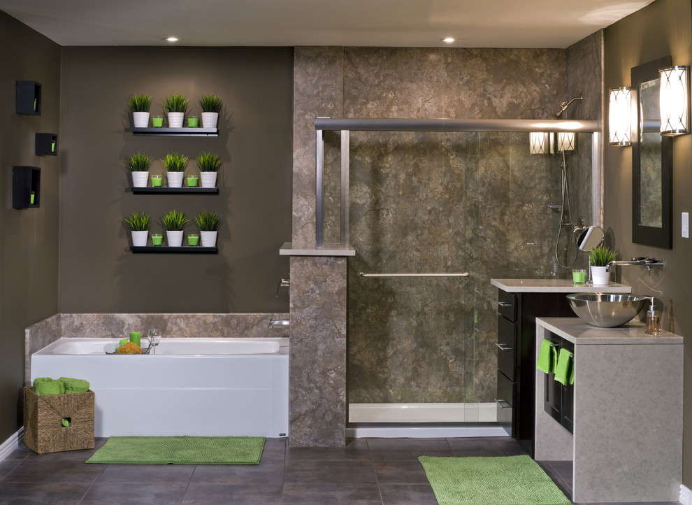 Design ideas for a medium sized contemporary ensuite bathroom in Other with a vessel sink, flat-panel cabinets, black cabinets, solid surface worktops, a corner bath, a corner shower, multi-coloured tiles, stone slabs, grey walls and porcelain flooring.