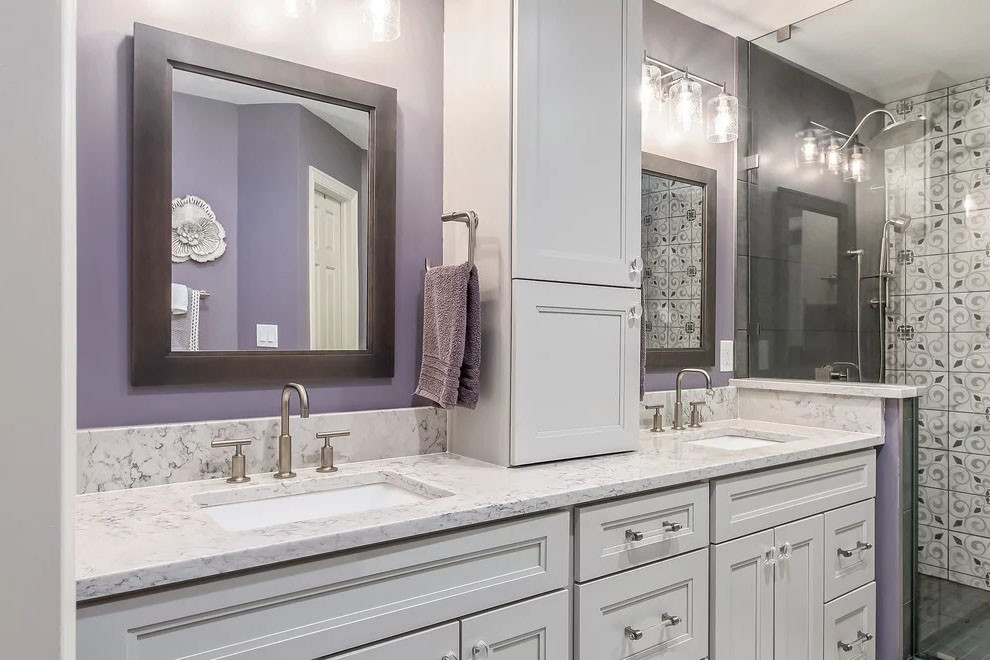 Bathroom - large transitional master multicolored tile and ceramic tile ceramic tile and gray floor bathroom idea in DC Metro with flat-panel cabinets, white cabinets, a two-piece toilet, purple walls, a drop-in sink, quartz countertops and white countertops