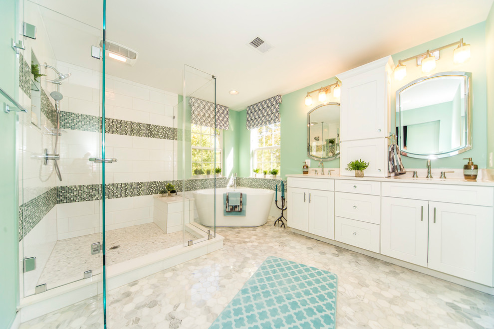 Inspiration for a large transitional master green tile and mosaic tile ceramic tile and gray floor bathroom remodel in DC Metro with recessed-panel cabinets, white cabinets, beige walls, an integrated sink, granite countertops and a hinged shower door