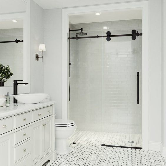 Mid-sized transitional master subway tile porcelain tile and white floor bathroom photo in Sacramento with raised-panel cabinets, a two-piece toilet, gray walls, a vessel sink, quartz countertops and white countertops