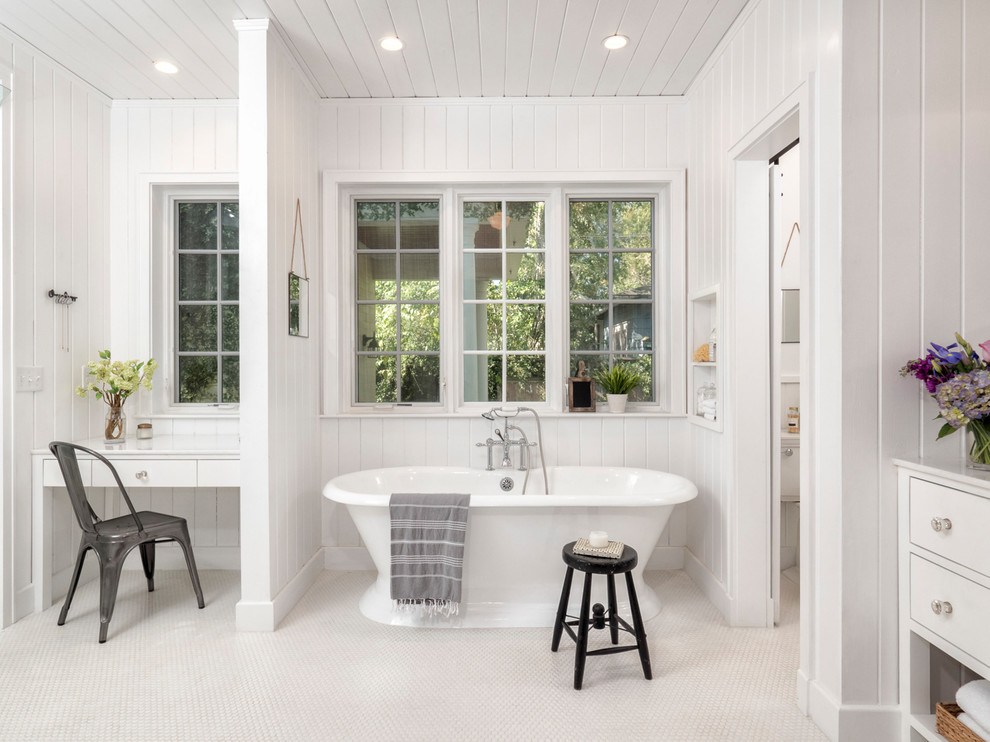 Bathroom - mid-sized country master white tile and subway tile mosaic tile floor bathroom idea with flat-panel cabinets, white cabinets, a two-piece toilet, white walls, an undermount sink and quartz countertops