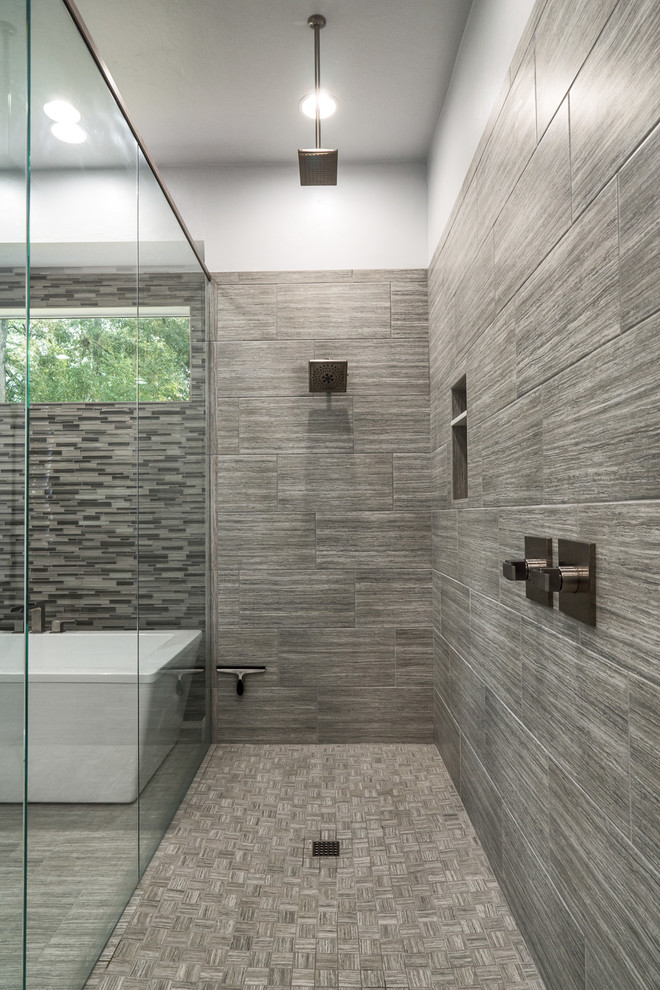 Bathroom - huge coastal master beige tile and ceramic tile ceramic tile bathroom idea with flat-panel cabinets, dark wood cabinets, a two-piece toilet, blue walls, an undermount sink and quartz countertops