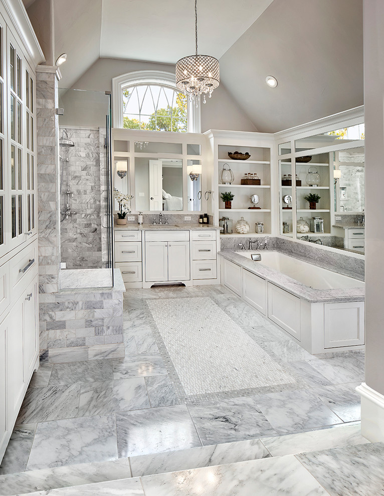 Bathroom - transitional master gray tile gray floor bathroom idea in Dallas with shaker cabinets, white cabinets, gray walls, an undermount sink and gray countertops