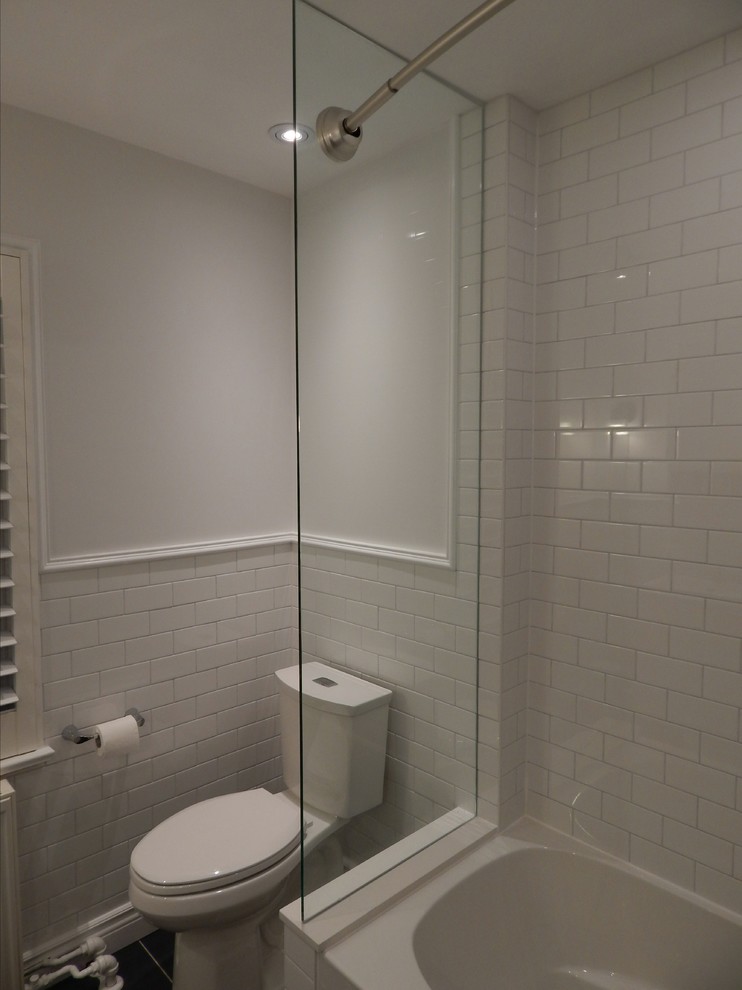 Bathroom reno with white subway tile and gray tile floor ...