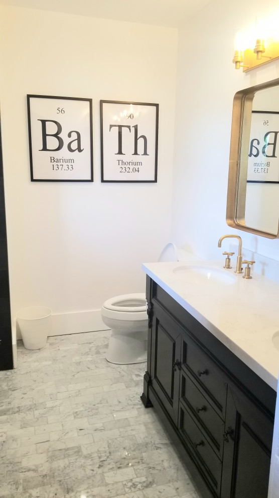 Design ideas for a medium sized contemporary family bathroom in Los Angeles with shaker cabinets, black cabinets, a freestanding bath, a shower/bath combination, a two-piece toilet, black tiles, cement tiles, white walls, marble flooring, a submerged sink, quartz worktops, white floors, a shower curtain and white worktops.
