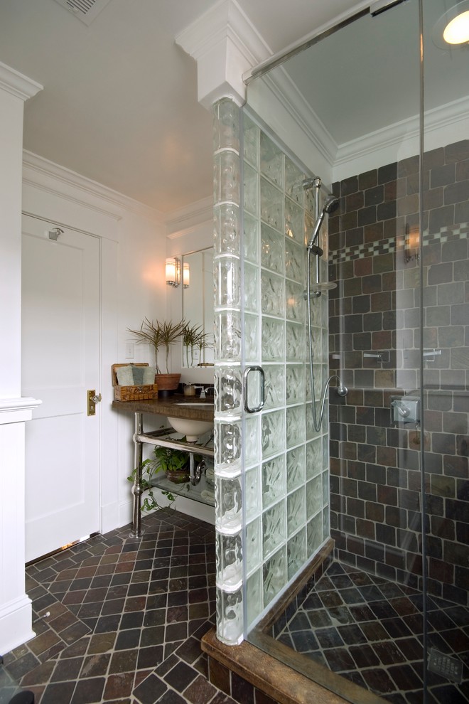This is an example of a medium sized contemporary shower room bathroom in Richmond with a corner shower, brown tiles, slate tiles, white walls, slate flooring, a submerged sink, granite worktops, brown floors and a hinged door.