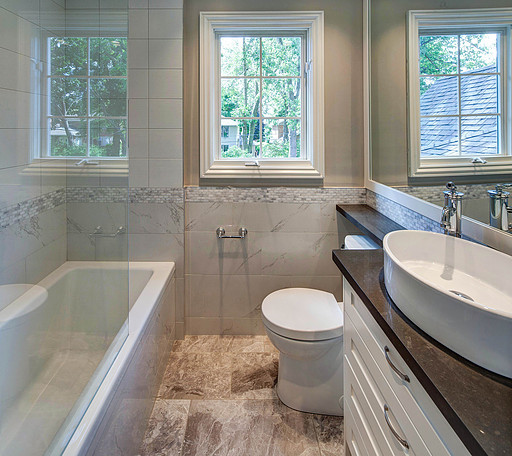 Inspiration for a mid-sized contemporary 3/4 gray tile, white tile and stone tile bathroom remodel in Toronto with shaker cabinets, white cabinets, beige walls and a vessel sink