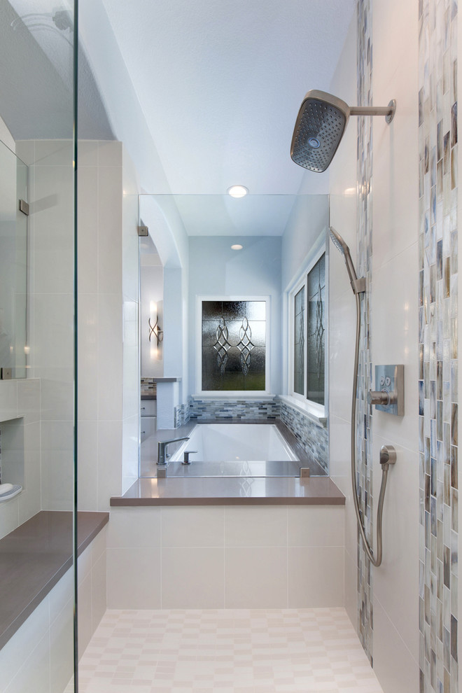 Example of a large transitional master blue tile and mosaic tile porcelain tile and gray floor alcove shower design in San Diego with shaker cabinets, white cabinets, an undermount tub, an undermount sink, a one-piece toilet, gray walls, quartz countertops and a hinged shower door