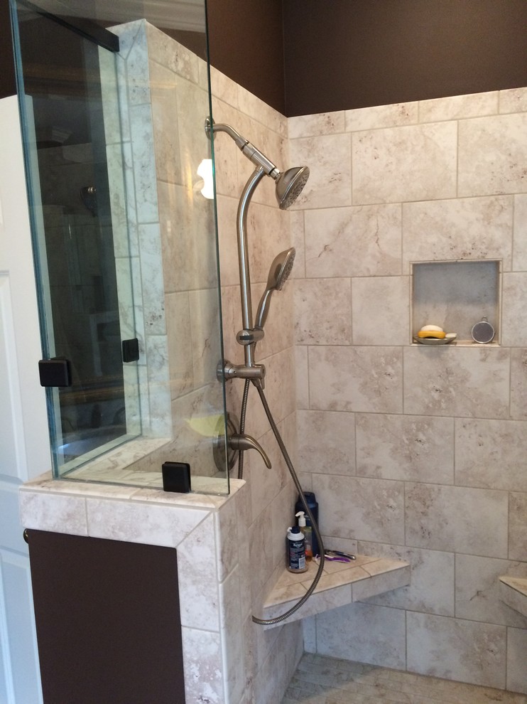 This is an example of a classic bathroom in Other with an alcove shower and brown walls.