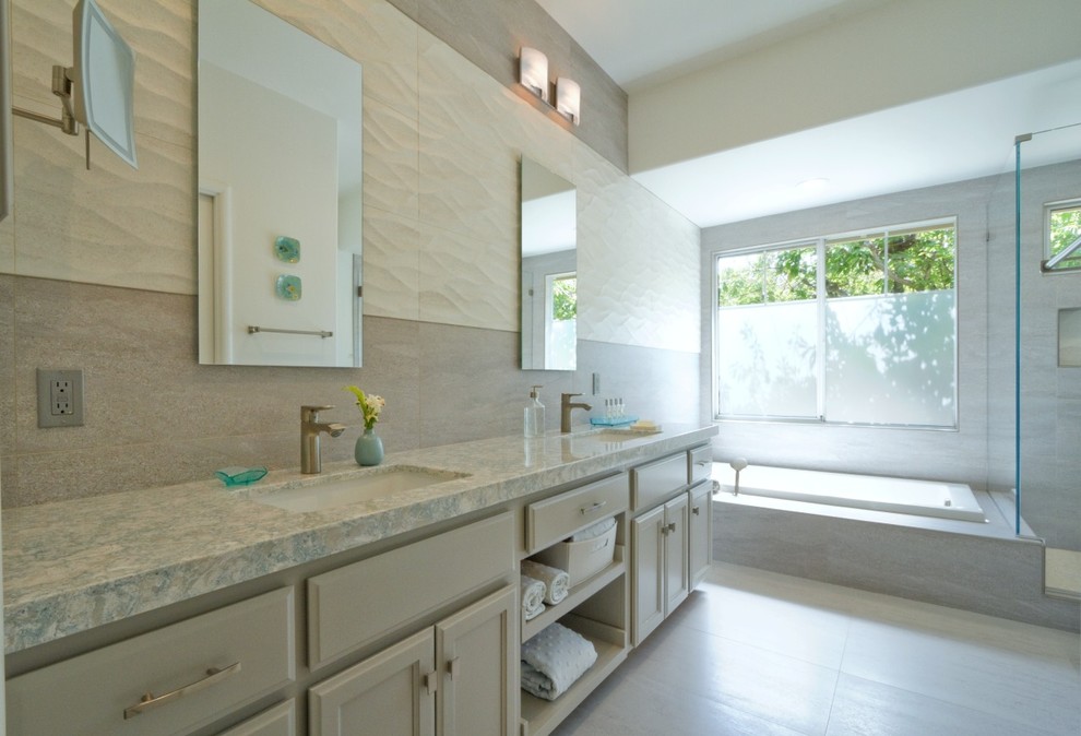 Example of a mid-sized trendy master beige tile and stone slab ceramic tile bathroom design in San Francisco with open cabinets, beige cabinets, a one-piece toilet, beige walls, a drop-in sink and quartzite countertops