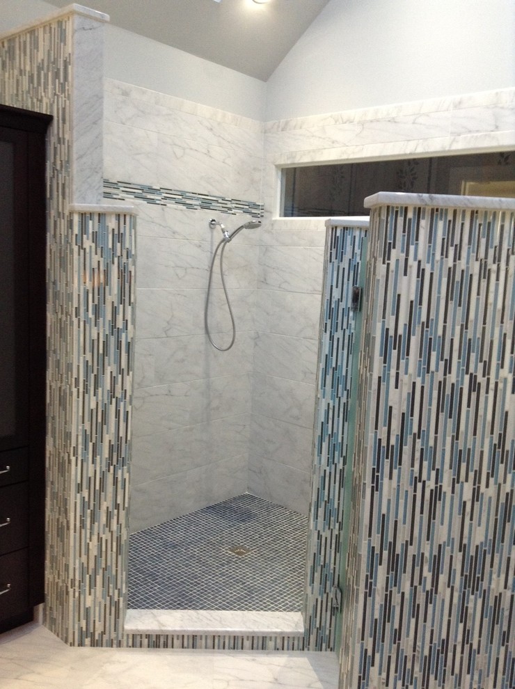 Trendy master blue tile marble floor corner shower photo in Raleigh with dark wood cabinets and gray walls