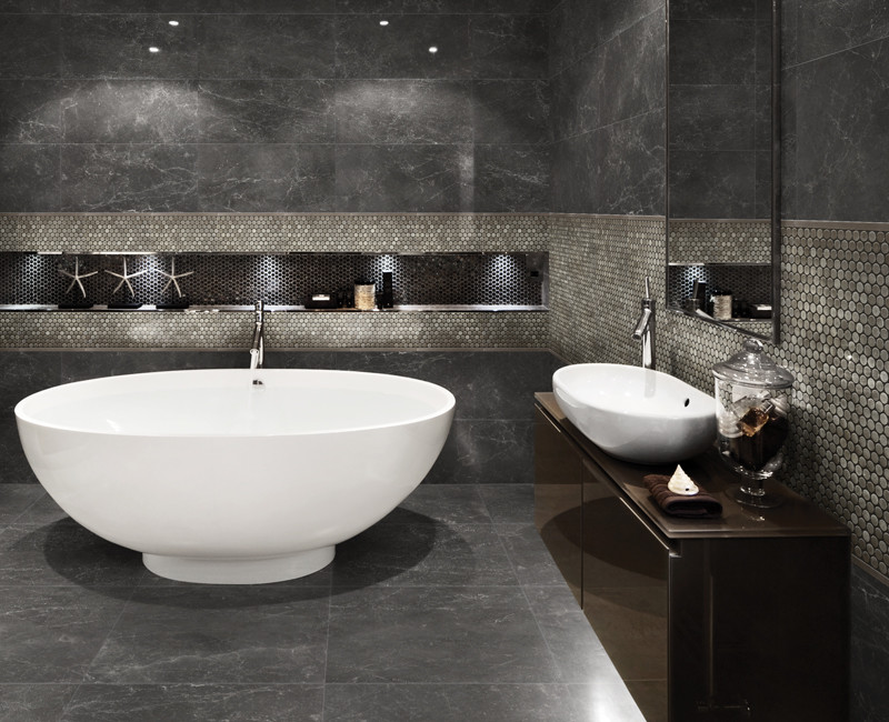 Example of a large trendy master brown tile and mosaic tile black floor freestanding bathtub design in Calgary with flat-panel cabinets, brown cabinets, black walls and a vessel sink