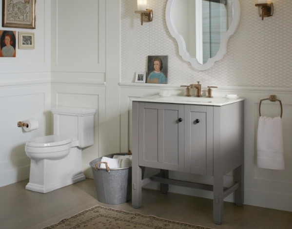Inspiration for a mid-sized cottage 3/4 medium tone wood floor and brown floor bathroom remodel in Columbus with shaker cabinets, gray cabinets, a one-piece toilet, white walls, an undermount sink and quartzite countertops