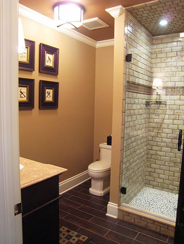 Bathroom - transitional beige tile and ceramic tile porcelain tile bathroom idea in New York