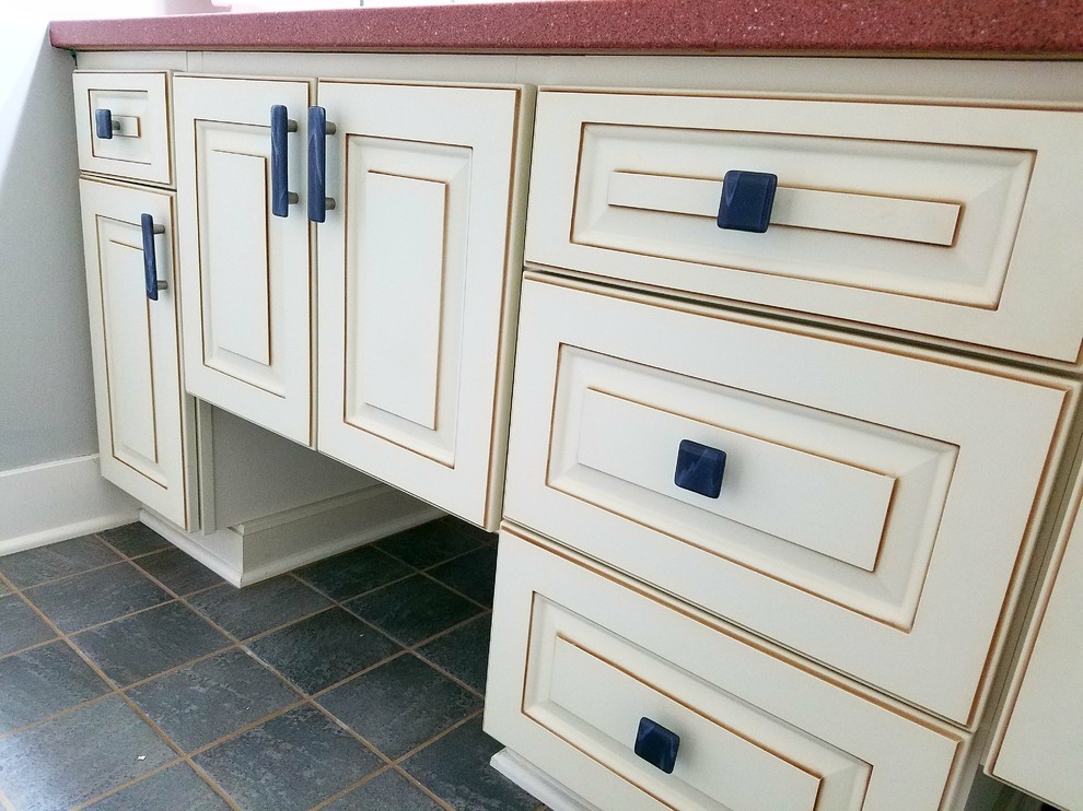 Bathroom with Cream Red Granite Counter top, and Grey Accents