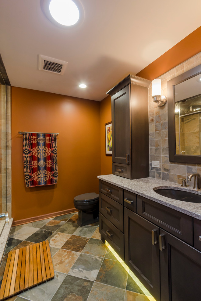 Inspiration for a mid-sized zen master multicolored tile and porcelain tile porcelain tile alcove shower remodel in Chicago with an undermount sink, recessed-panel cabinets, gray cabinets, quartz countertops, a two-piece toilet and orange walls