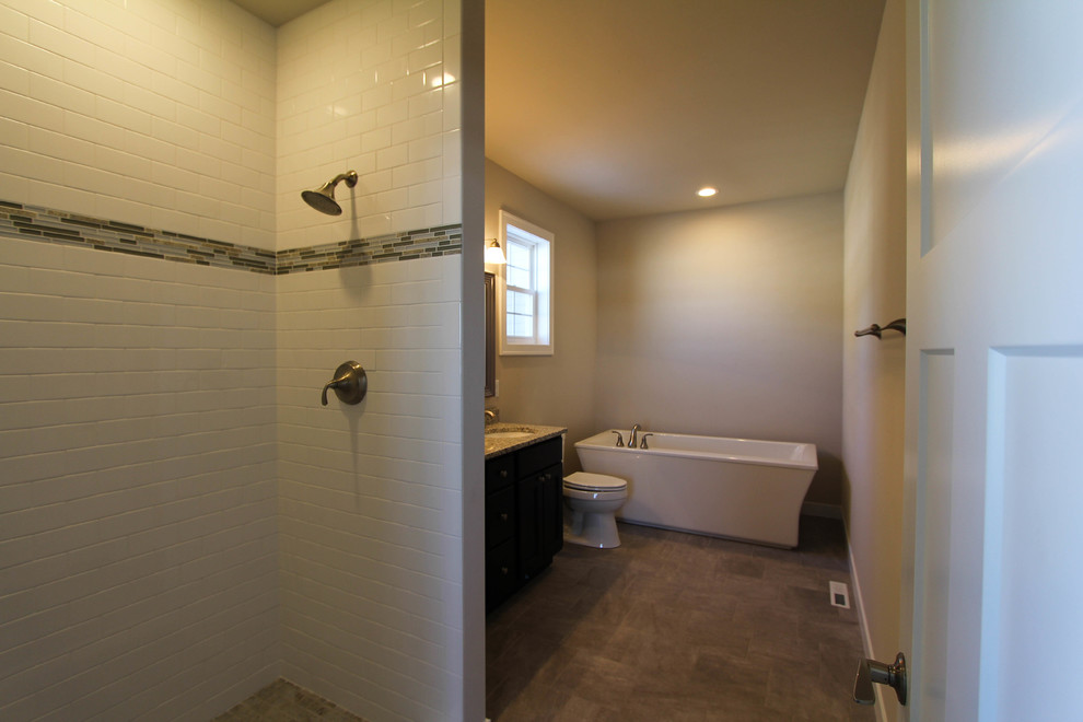 Idee per una stanza da bagno padronale chic con ante in legno bruno, top in granito, piastrelle grigie, piastrelle in gres porcellanato e pavimento in gres porcellanato
