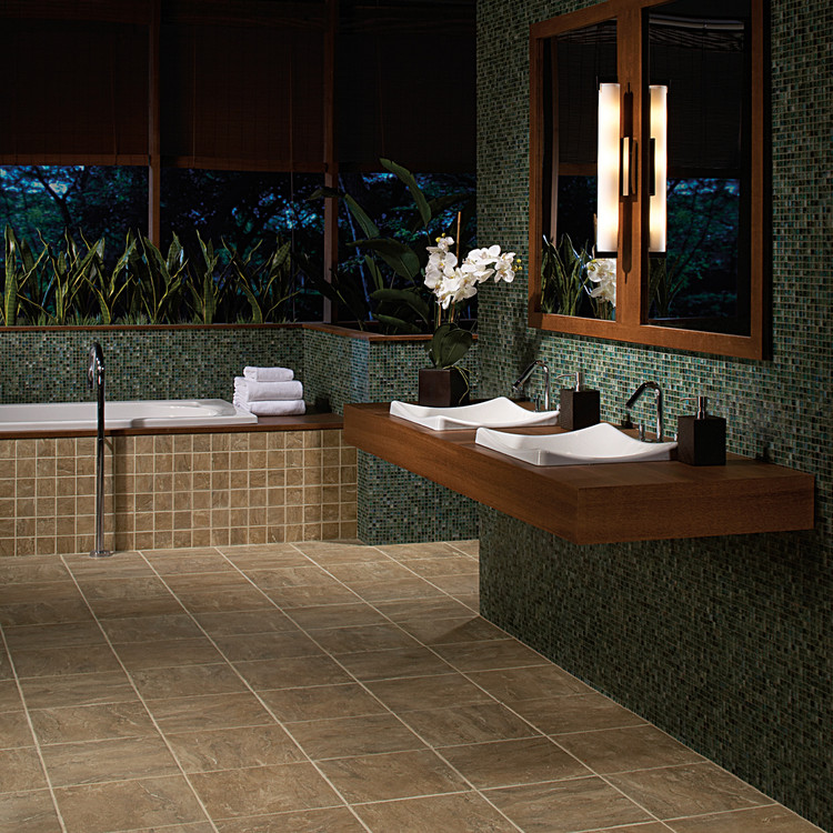 Imagen de cuarto de baño principal asiático grande con armarios abiertos, bañera encastrada, baldosas y/o azulejos verdes, baldosas y/o azulejos en mosaico, paredes verdes, lavabo encastrado y encimera de madera
