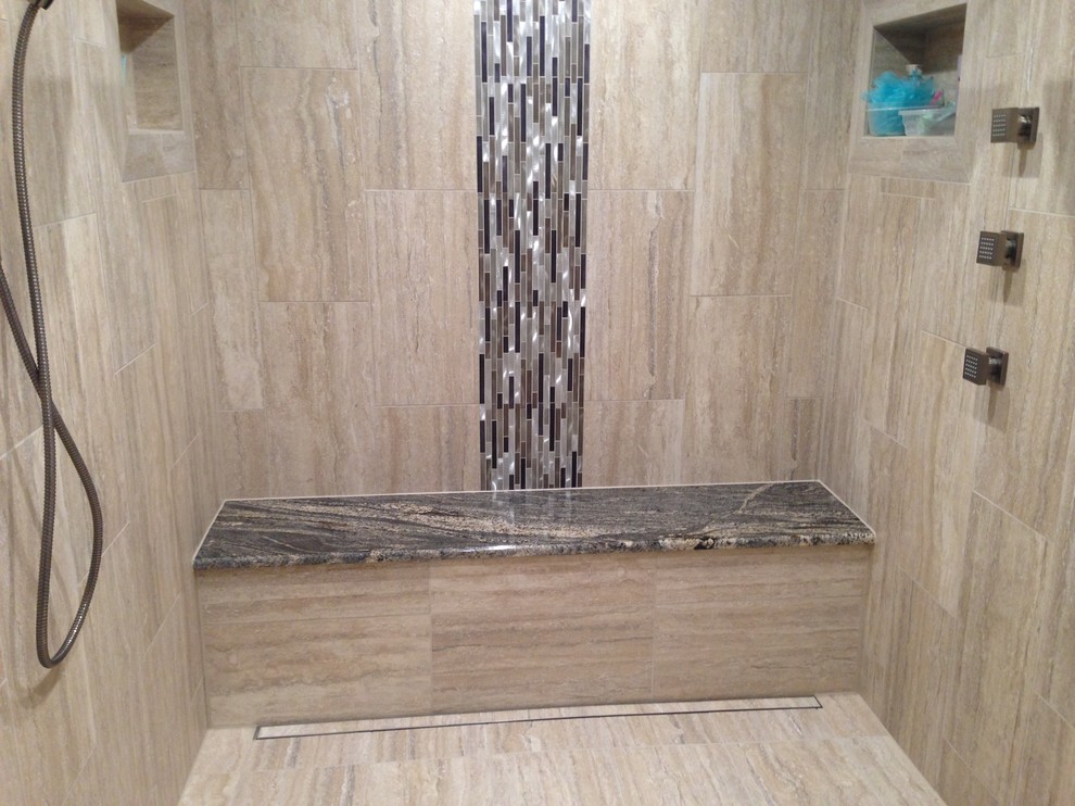 Example of a mid-sized transitional master beige tile and porcelain tile porcelain tile and beige floor bathroom design in Other with a two-piece toilet and beige walls