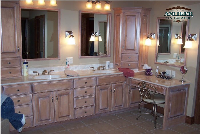 This is an example of a classic bathroom in Chicago with an integrated sink and shaker cabinets.