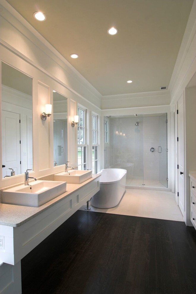 Mid-sized minimalist master white tile and mosaic tile light wood floor and brown floor bathroom photo in DC Metro with flat-panel cabinets, light wood cabinets, a one-piece toilet, white walls, a vessel sink, quartz countertops and a hinged shower door